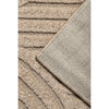 Close-up of textured beige runner rug with a subtle pattern