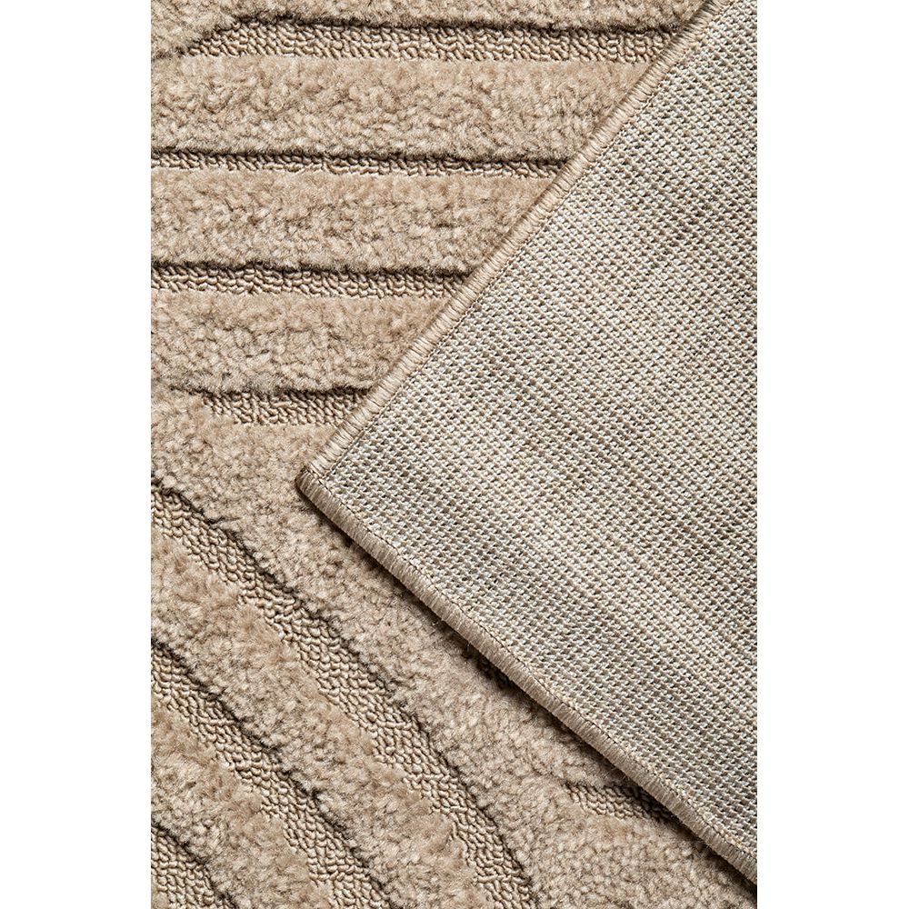 Close-up of textured beige runner rug with a subtle pattern