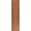 Rust textured rug on a white background