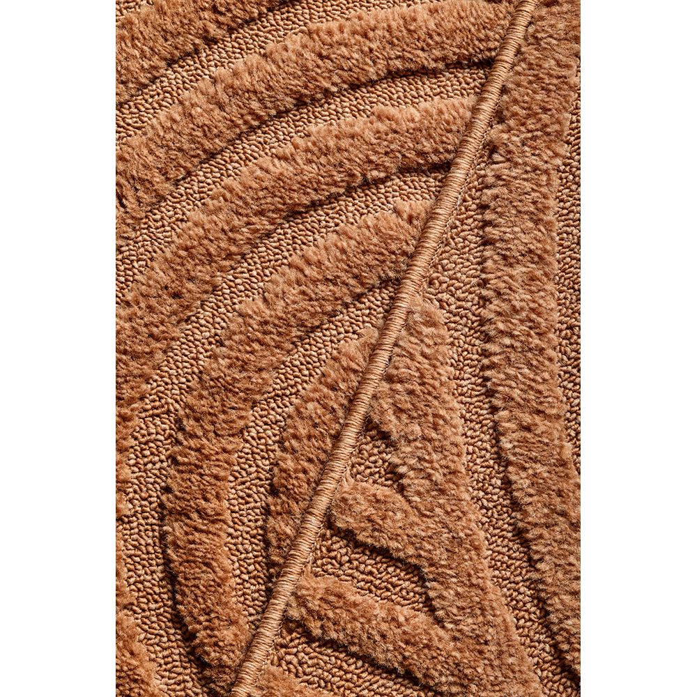 Close-up of a rust textured rug