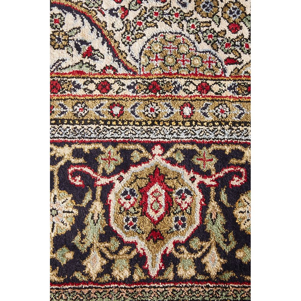 Close-up of a patterned Hand Knotted Silk Rug with intricate designs