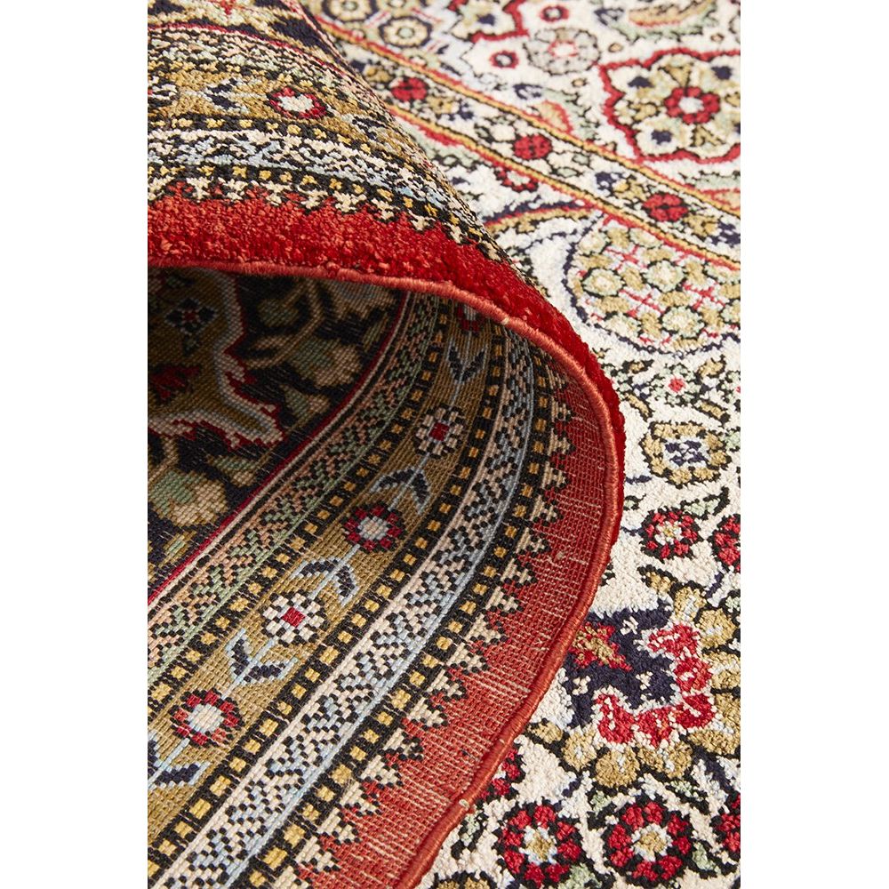 Close-up of a patterned Hand Knotted Silk Rug with red border