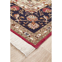 Decorative Persian rug with intricate patterns on a wooden floor