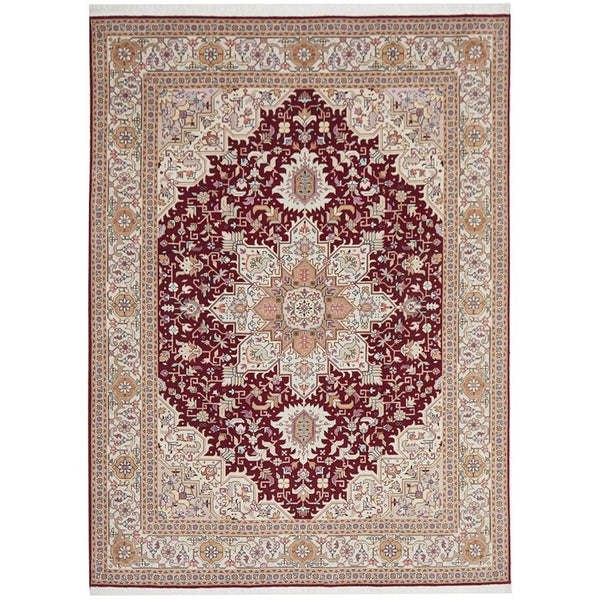 Decorative Persian wool rug with intricate patterns in red and beige