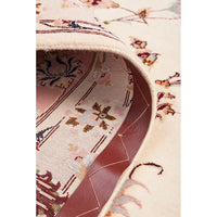 Close-up of a patterned Persian wool rug with intricate designs