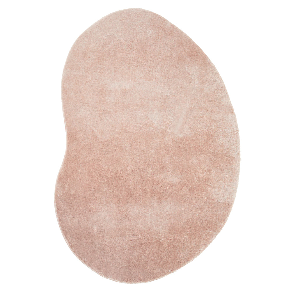 Soft pale pink modern rug with an abstract organic shape and plush texture.