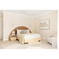 Modern bedroom with wooden bed, nightstands, and a chair.