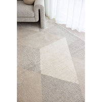 Close-up of a textured gray carpet with a soft focus effect