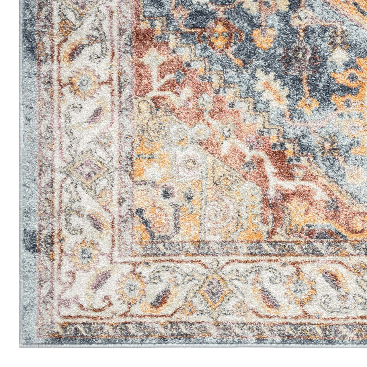 Blue, orange, and beige traditional patterned runner rug corner with intricate floral and geometric designs.
