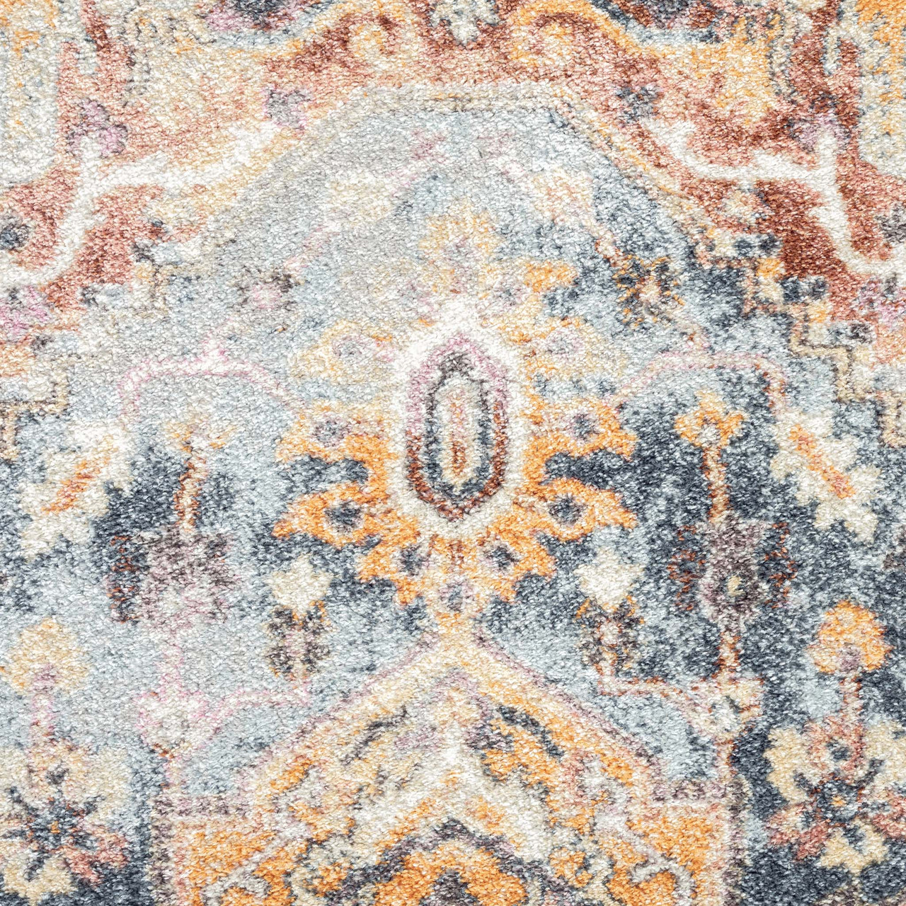 Blue and orange traditional patterned runner rug with intricate multi-colored motifs and textured weave.