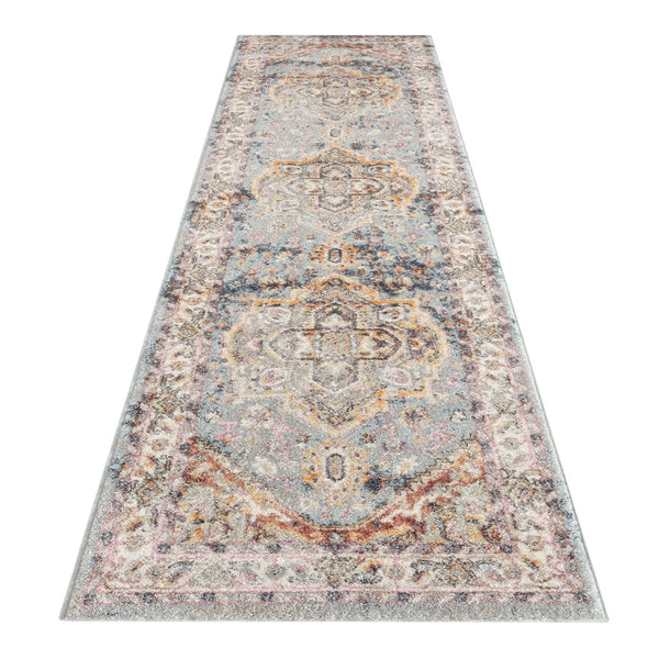 Blue multi-colored traditional patterned runner rug with intricate floral and geometric designs.