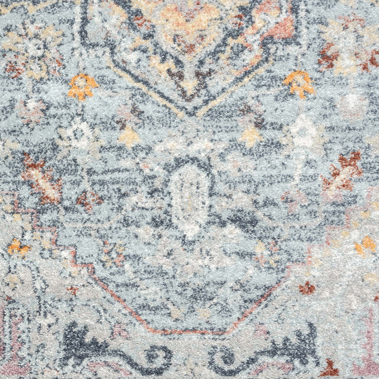 Blue multi-colored traditional patterned runner rug with intricate orange, white, and gray details.