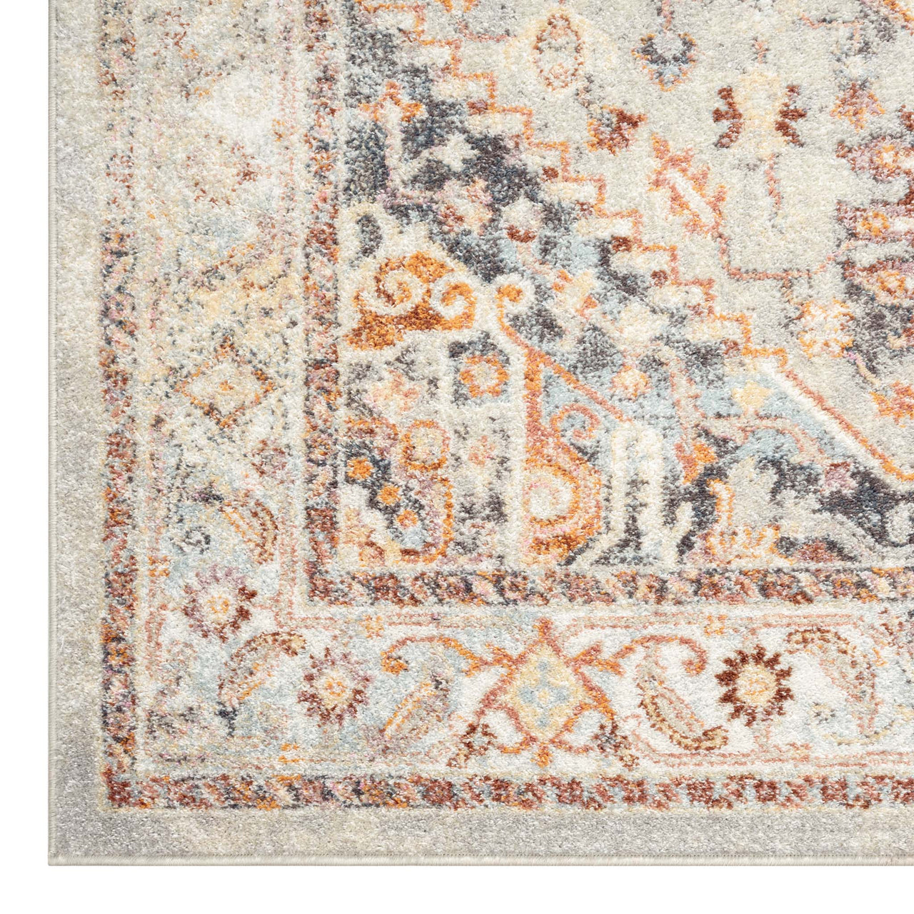 Traditional runner rug with intricate multi-colored patterns in beige, orange, gray, and brown tones.
