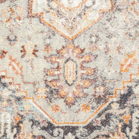 Multi-coloured traditional patterned runner rug with beige, orange, and dark grey geometric motifs.