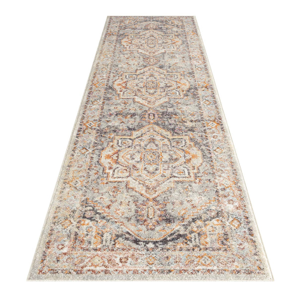 Multi-colored traditional patterned runner rug with beige, orange, and gray tones and intricate geometric designs.
