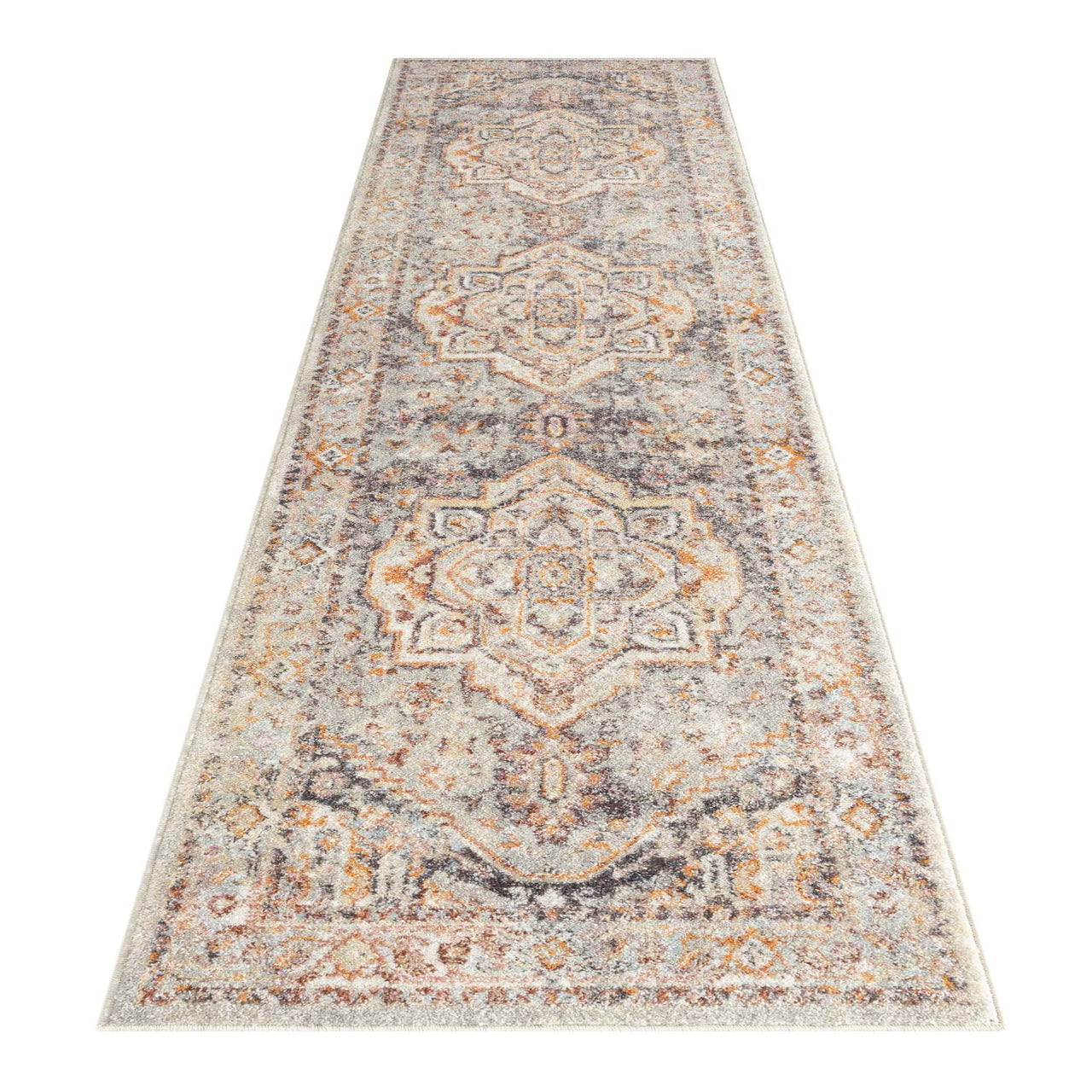 Multi-colored traditional patterned runner rug with beige, orange, and gray tones and intricate geometric designs.