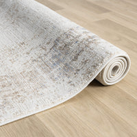 Beige and cream runner rug with textured abstract multi-colored pattern, soft polyester-polypropylene blend.