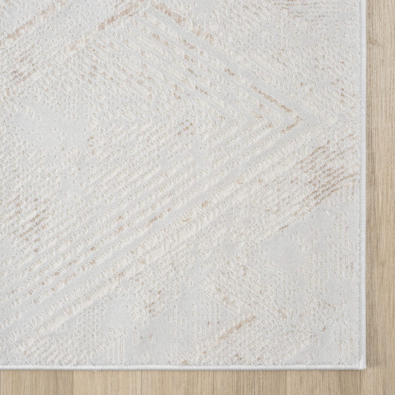 Beige and white modern runner rug with subtle geometric pattern and textured design.