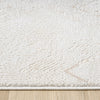 Beige and white modern runner rug with subtle textured abstract pattern on a light background.
