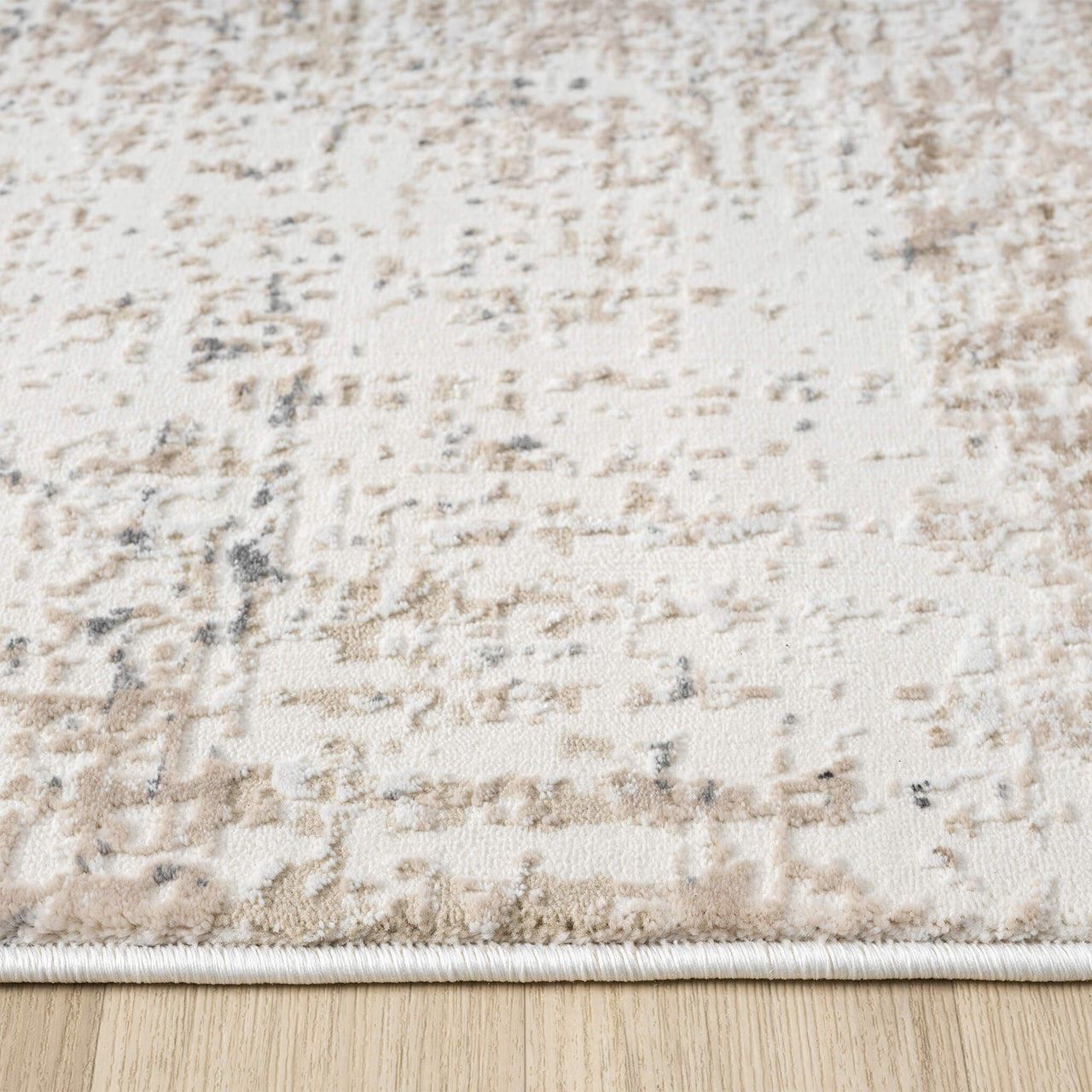 Beige and grey modern runner rug with subtle abstract multi-color pattern and soft texture.