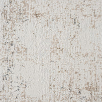 Beige and grey modern rug with abstract textured pattern and soft pile surface.