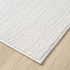 Cream modern runner rug with subtle textured geometric pattern and clean edges on wood floor.