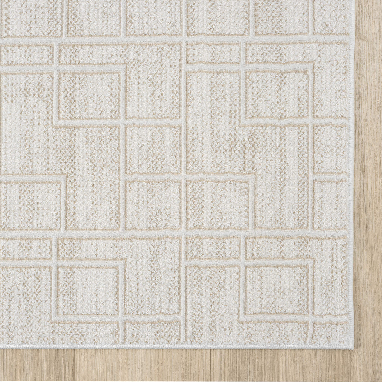 Cream modern runner rug with textured geometric square pattern and subtle contrast edges.