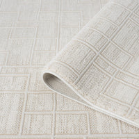 Cream modern runner rug with textured geometric square pattern and plush pile.