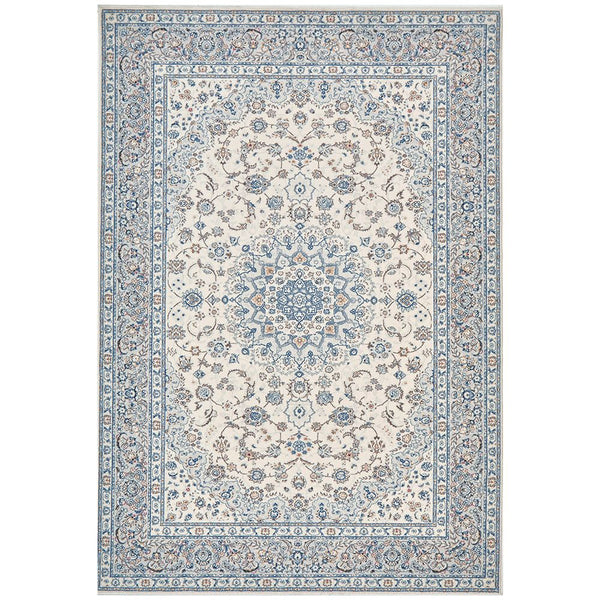 Ivory and blue traditional Kashan rug with intricate floral motifs and detailed border design.