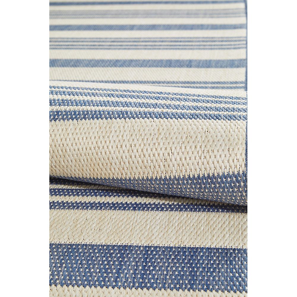 Striped blue and beige rug.