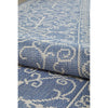 Close-up of a blue and white patterned outdoor runner rug