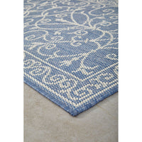 Blue and white patterned outdoor runner rug