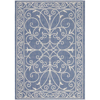 Decorative blue and white indoor outdoor rug with intricate patterns.