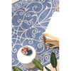 Decorative blue and white patterned rug with a bowl of fruit on a tiled surface.