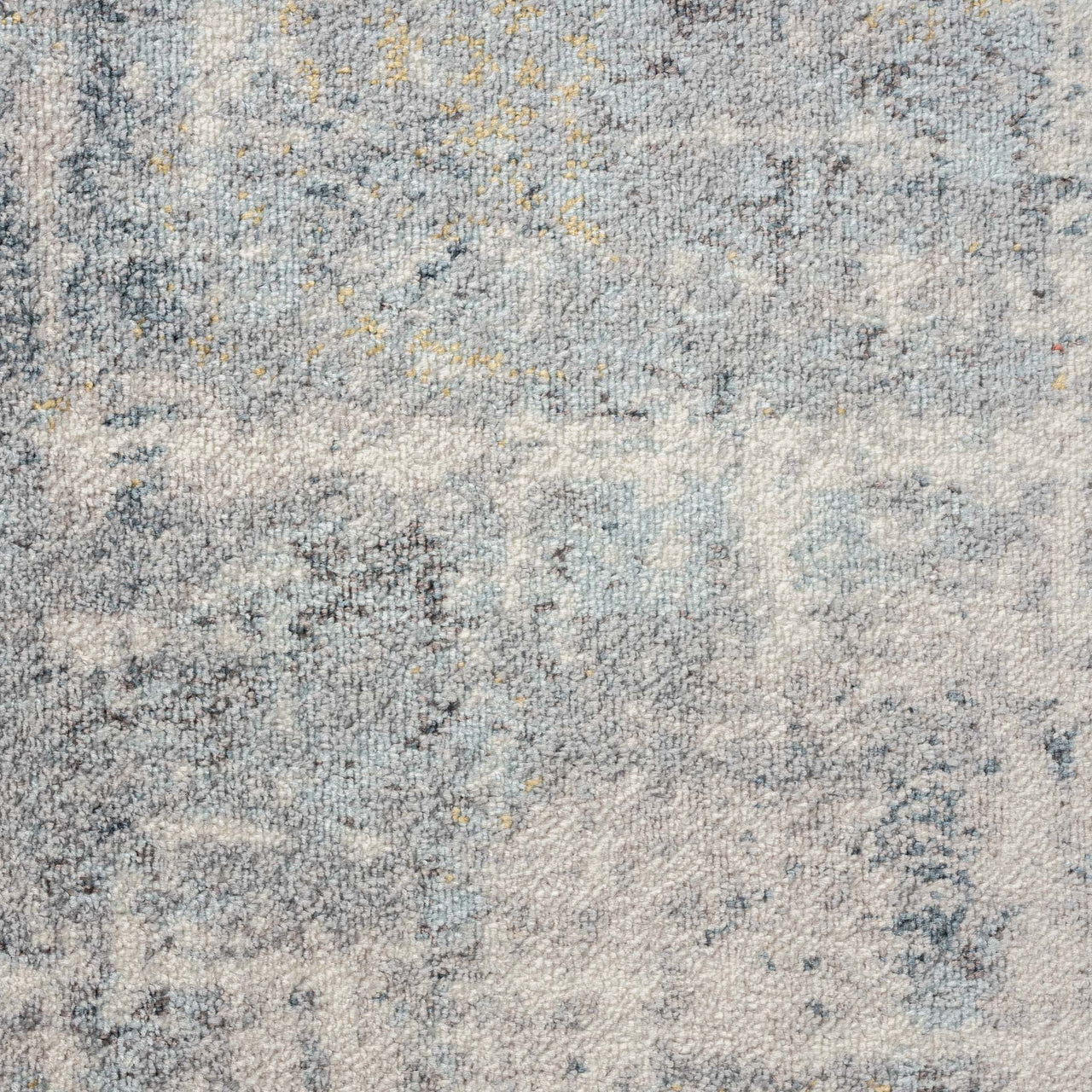 Grey multi-colored abstract patterned runner rug with textured, distressed design.