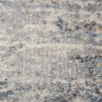 Grey and beige abstract patterned rug with subtle accents of gold and charcoal tones, soft polypropylene texture.