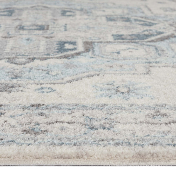 Blue and beige transitional runner rug with subtle geometric patterns and soft texture.
