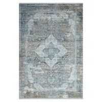 Grey blue patterned transitional rug with central medallion and distressed texture.