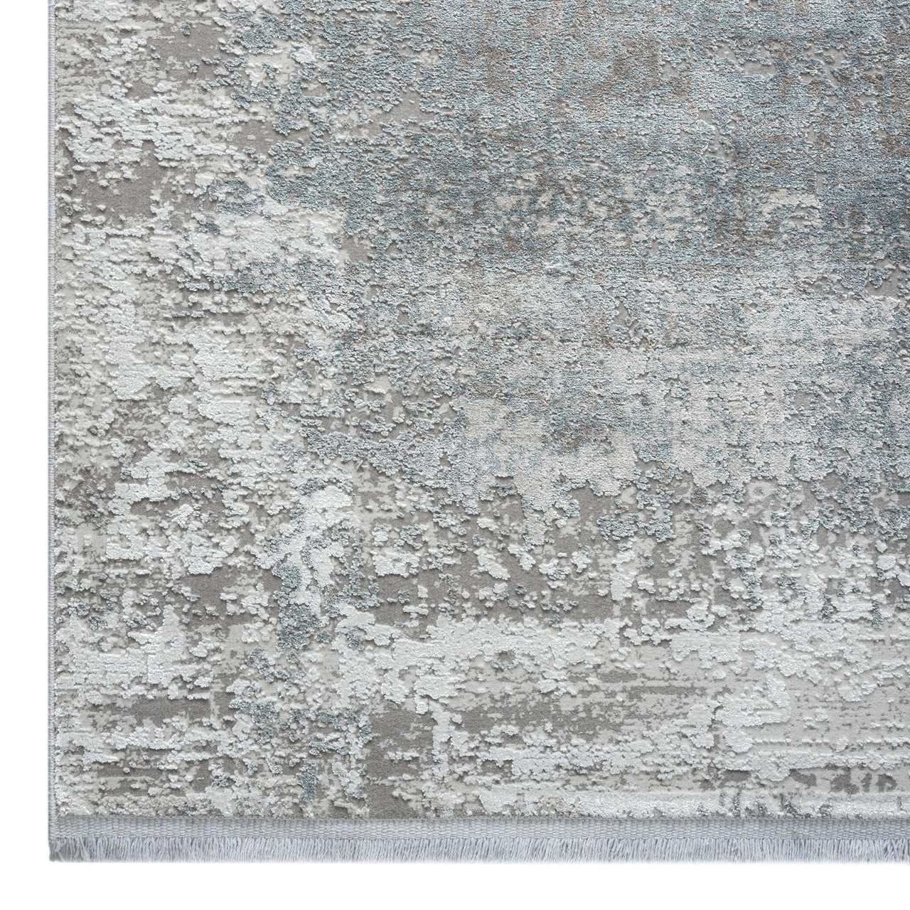 Grey rug with white and blue abstract pattern and subtle textured design.