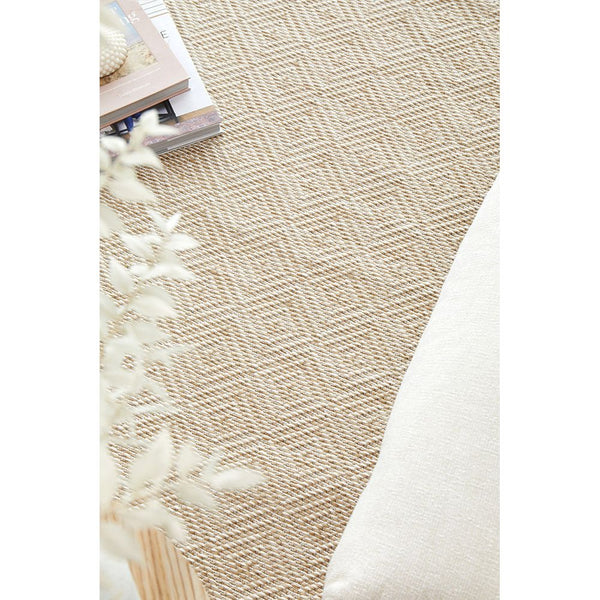 Cream natural flatweave rug with subtle geometric diamond pattern, polypropylene material.