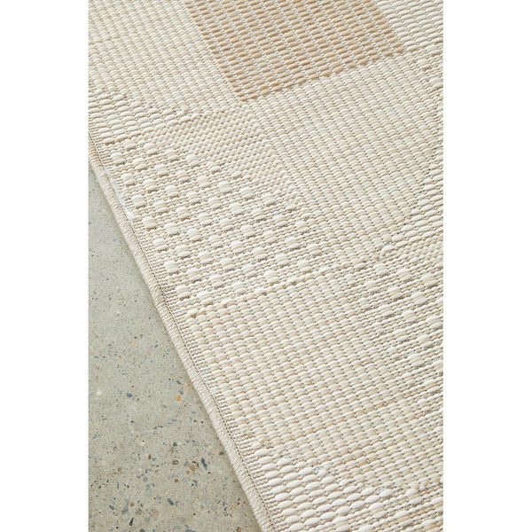 Natural cream flatweave rug with subtle textured geometric pattern and polypropylene material.