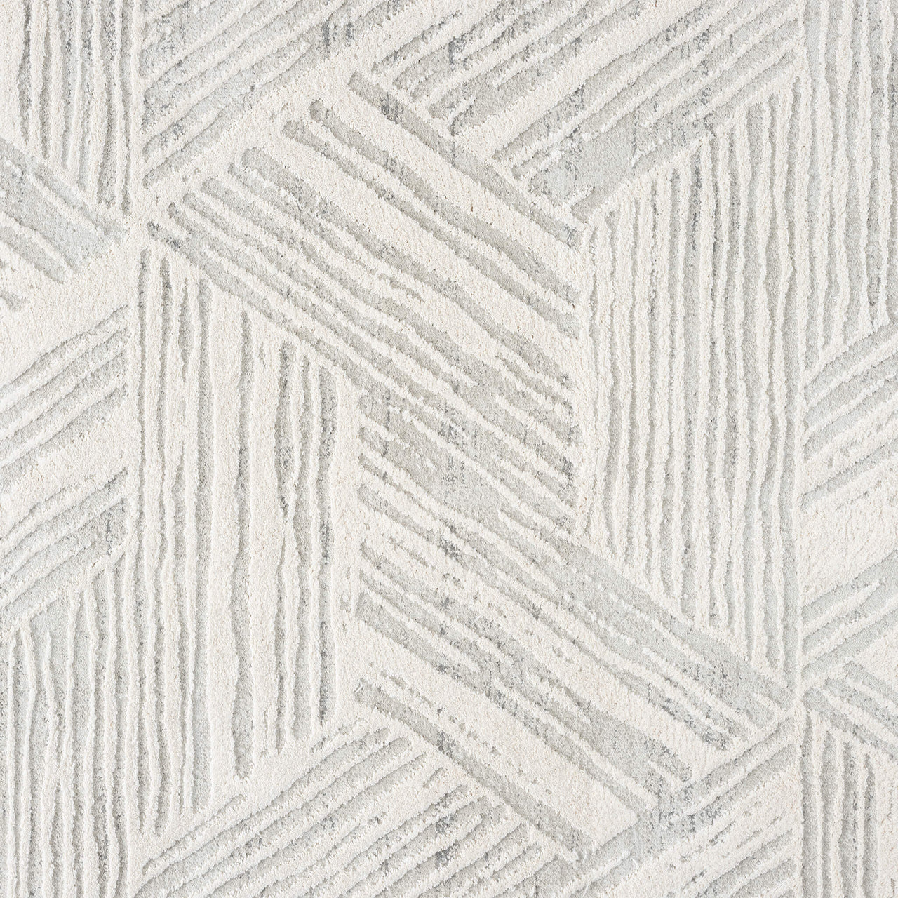 Light grey runner rug with a geometric textured pattern and soft pile surface.