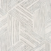 Light grey runner rug with a geometric textured pattern and soft pile surface.