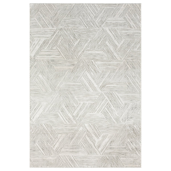 Light grey rug with overlapping geometric hexagon patterns and textured pile detail.