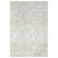 Light grey rug with overlapping geometric hexagon patterns and textured pile detail.