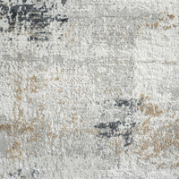 Grey multi-colored abstract textured rug with beige and dark grey accents.
