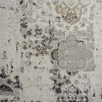 Grey and beige textured abstract modern runner rug with floral and geometric patterns.