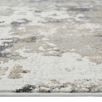 Grey and beige abstract textured runner rug with subtle pastel accents and a soft pile finish.