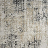 Grey and beige multi-textured modern rug with abstract pattern and soft neutral tones.