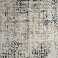 Grey and beige multi-textured modern rug with abstract pattern and soft neutral tones.